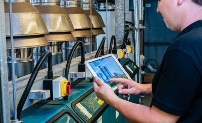 Maintenance worker working on a tablet