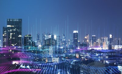 City skyline by night in tech style.