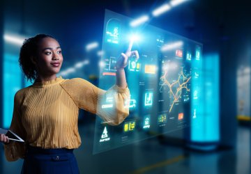 Female engineer operating holo screen.