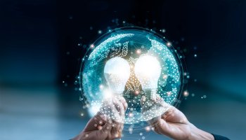 Two hands holding glowing light bulbs within a digital globe.