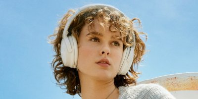 Blond woman with a headset.
