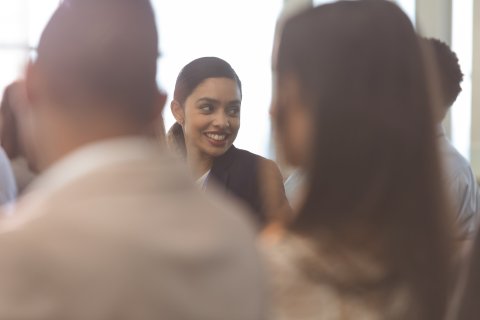 Business woman in a meeting.