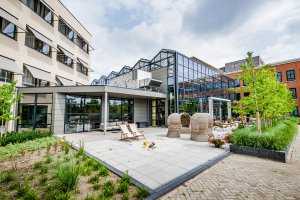 Planon campus with office buildings, greenhouse and garden.