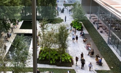 People walking in the green office
