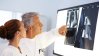 Healthcare - two doctors looking at a xray