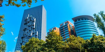 High modern buildings with trees.