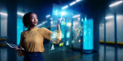 Female engineer operating holo screen.