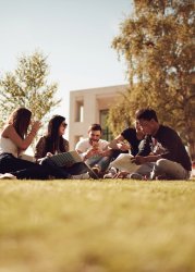 Group of students enjoying free time on a university campus