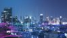 City skyline by night in tech style.