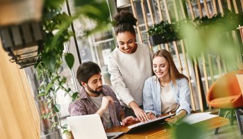 Young team working with laptop