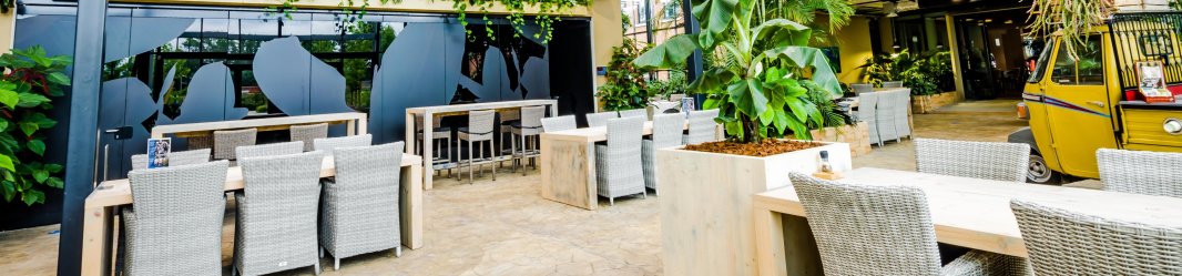 Sustainable greenhouse with meeting room, workspaces and coffee bar,