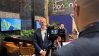 Behind-the-scenes view of a video interview being recorded at the Planon Real Estate stand.