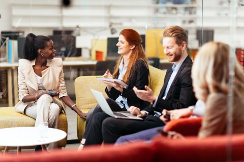 Colleagues meeting in a flexible workspace