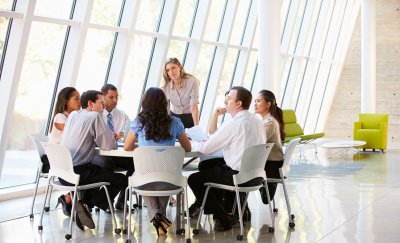 Group of colleagues discussing space management