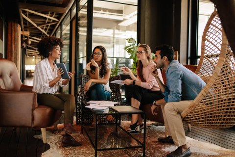 Workplace meeting and discussion.