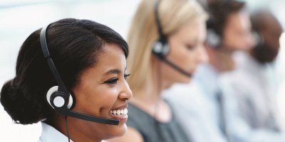 Customer support team wearing headsets