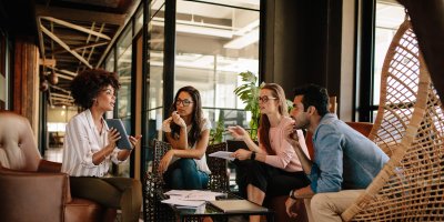 Workplace meeting and discussion.