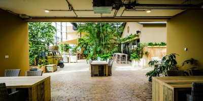 Entrance of greenhouse with workspaces.