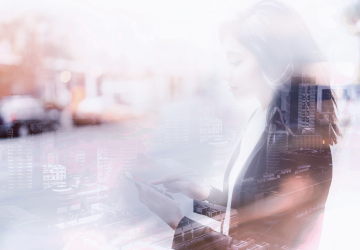 Double exposure successful female employer typing text message on her cellphone outdoor.