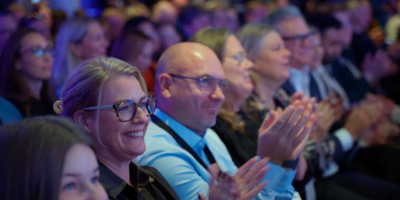 Audience clapping at IFMA Nordic Workplace 2025