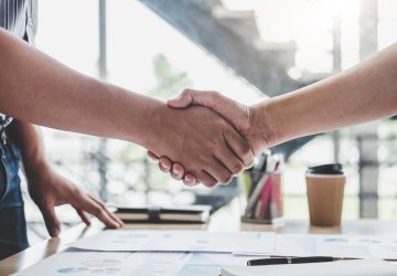 Two people shaking hands