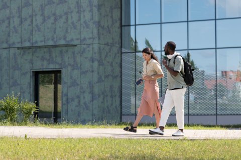 Students walking at university campus