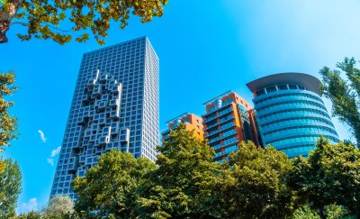 High modern buildings with trees.