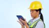 Maintenance women looking at tablet