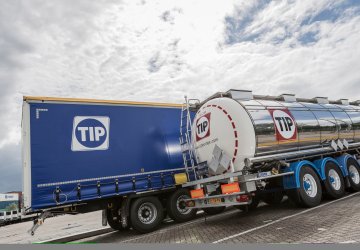 Two trucks with TIP logo.