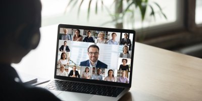 Virtual meeting with lots of business people.