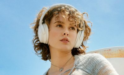 Blond woman with a headset.