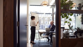Business people brainstorming on real estate management