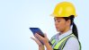 Maintenance women looking at tablet