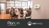 Planon & Airthings logos, indoor air quality sensor and people discussing at a table.