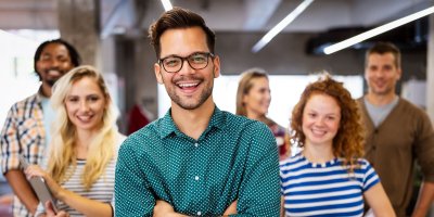 Group of happy coworkers in their work environment 