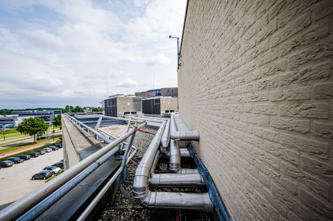 Building rooftop with maintenance installations.