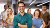 Group of happy coworkers in their work environment 