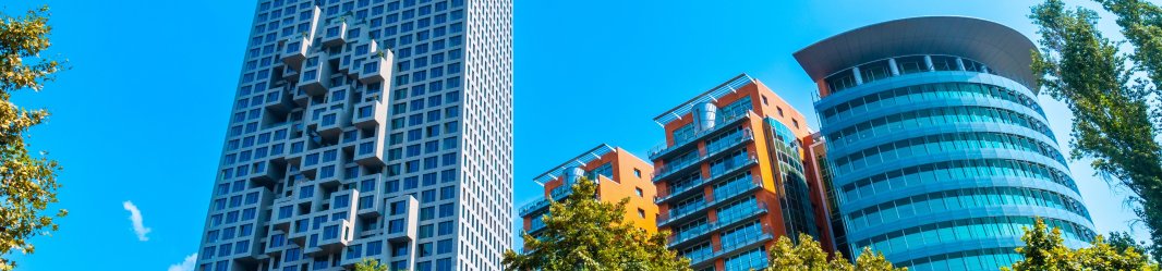 High modern buildings with trees.