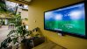 Screen with data on energy and sustainability.